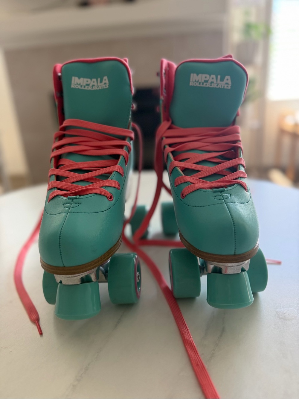 Impala Roller Skates in Teal with Pink Laces